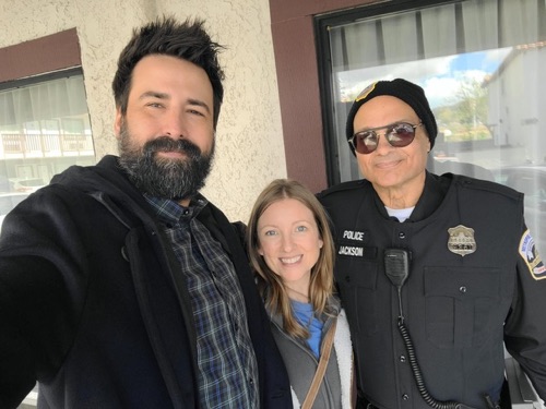 Joe Gironda in police uniform on location