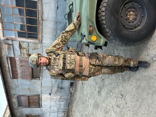 Joe Gironda in tactical military gear on set