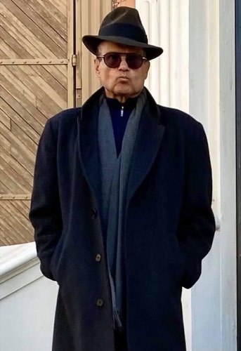 Joe Gironda in overcoat and fedora